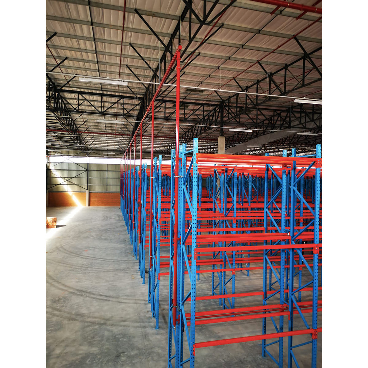 Storage rack fire sprinkler system
